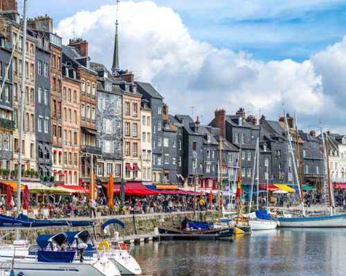 Pretty seafront houses and marina in Honfleur    Shutterstock
